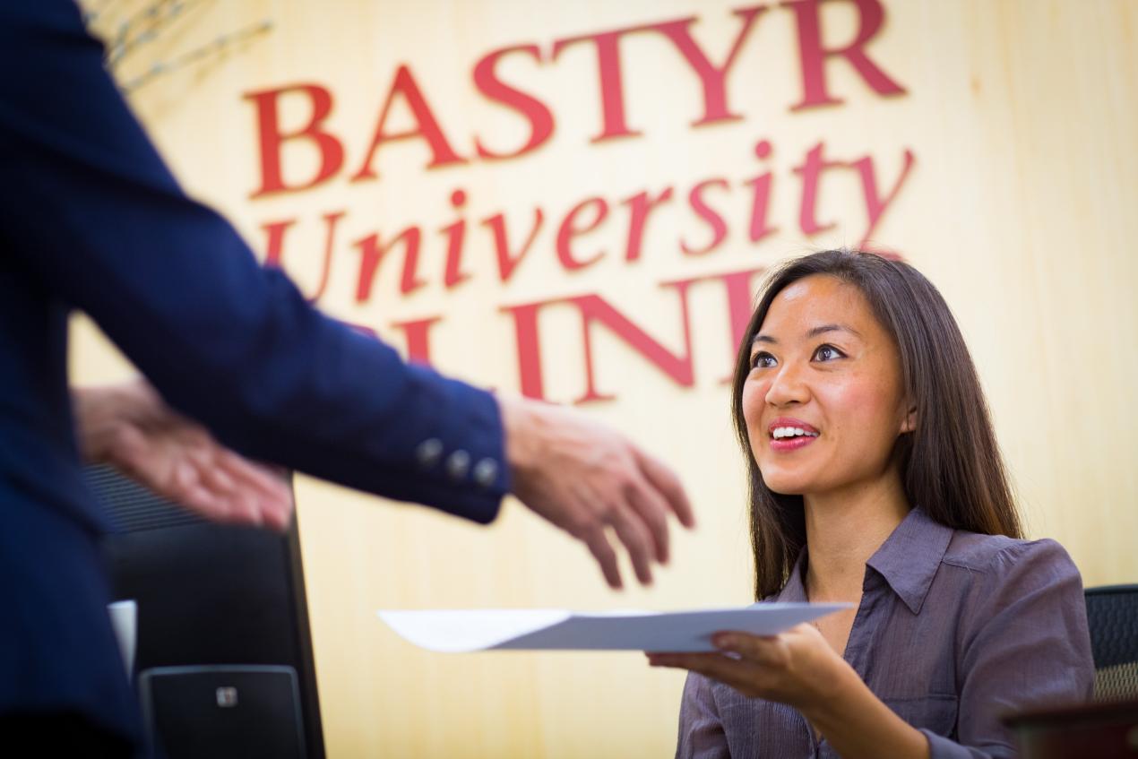 person at reception at Bastyr University Clinic