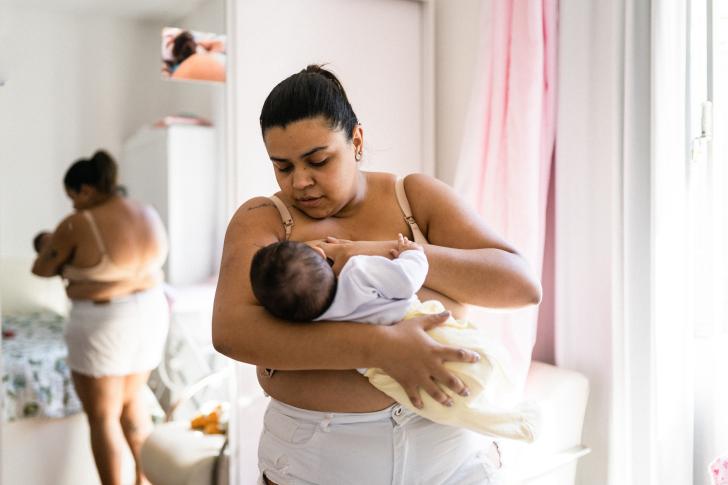 pospartum woman breastfeeding
