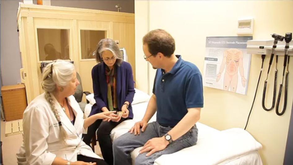 patients and doctor in an exam room