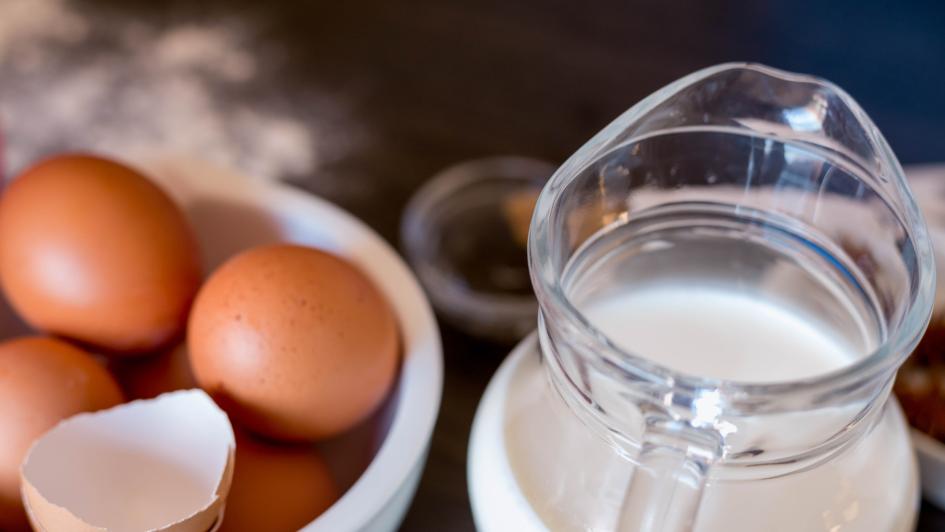 bowl of eggs and separated egg whites in measuring cup