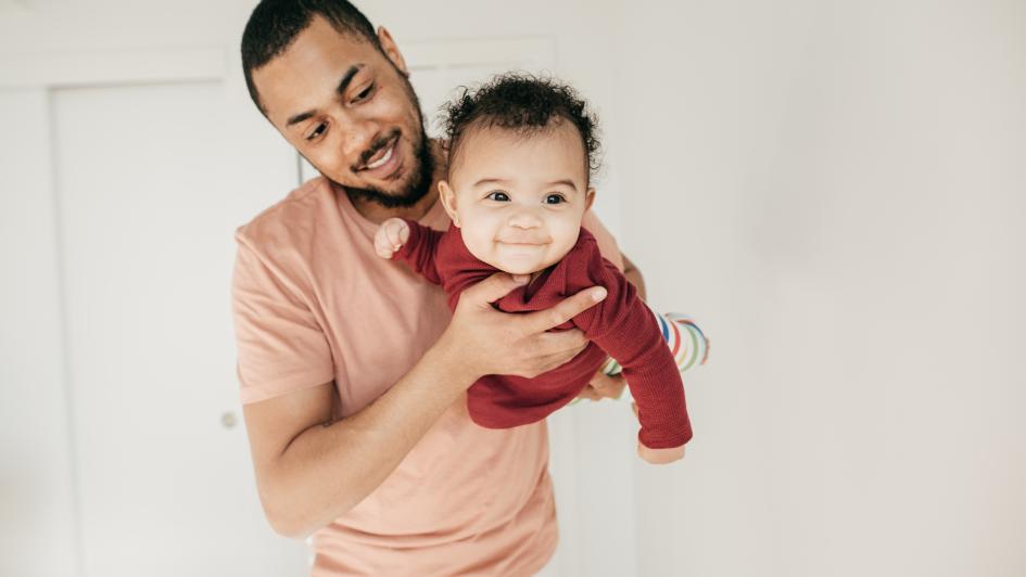 father holding a child